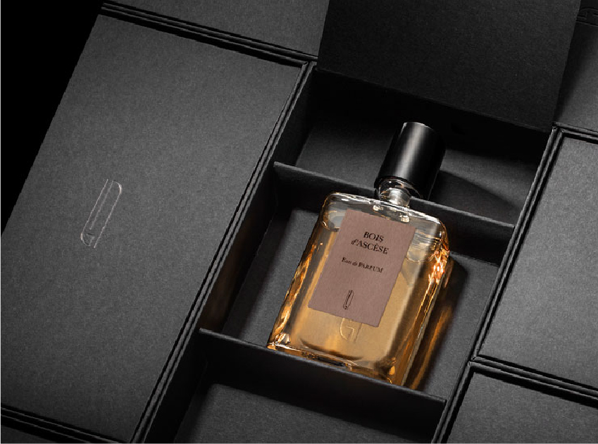 a bottle of bois d'ascese by naomi goodsir in a black box