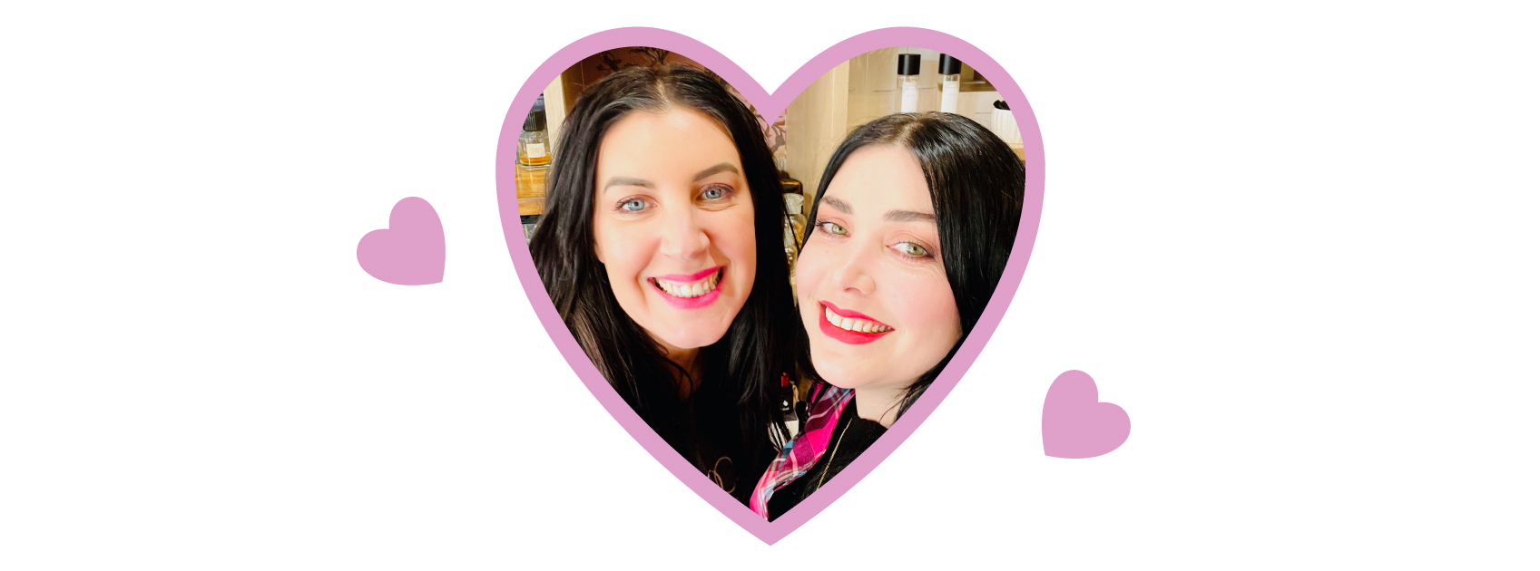 owners of lore perfumery jess and jade in a heart frame