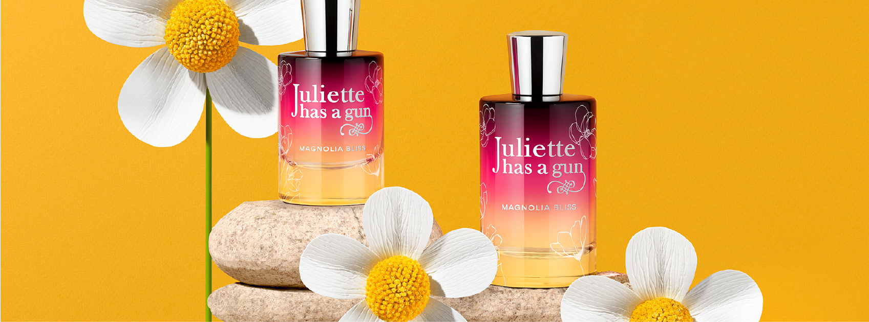 bottles of magnolia bliss by juliette has a gun with flowers