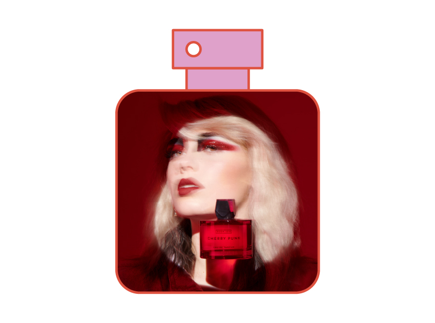 photo of woman with a bottle of cherry punk by room 1015 in a perfume bottle