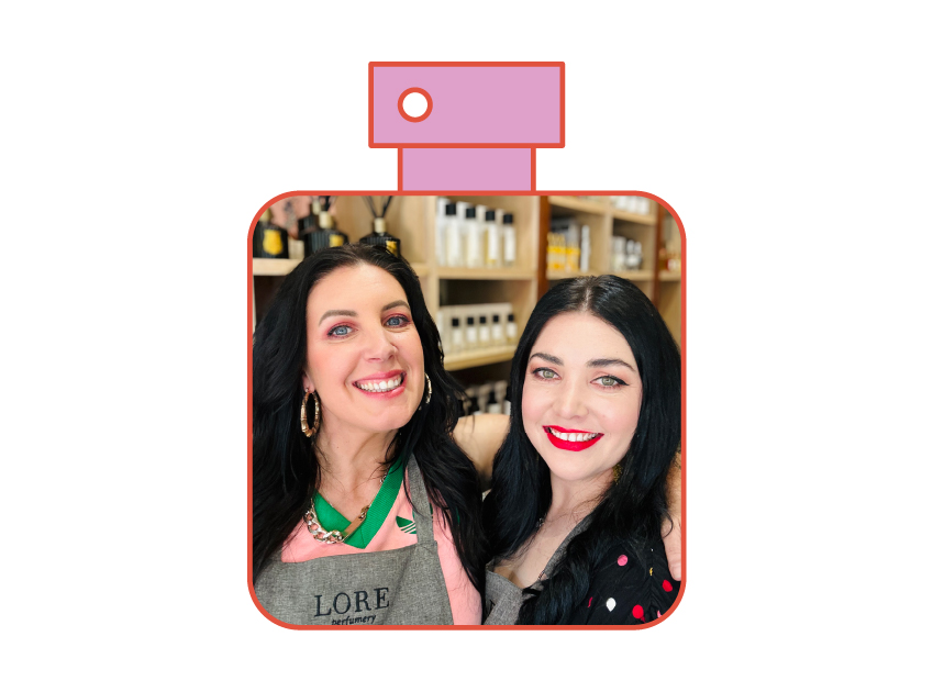 photo of jade and jess, the founders of lore perfumery in a perfume bottle