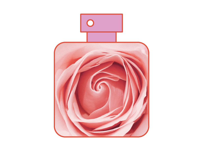 photo of a rose in a perfume bottle