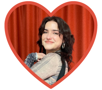 laura from the lore team in a love heart