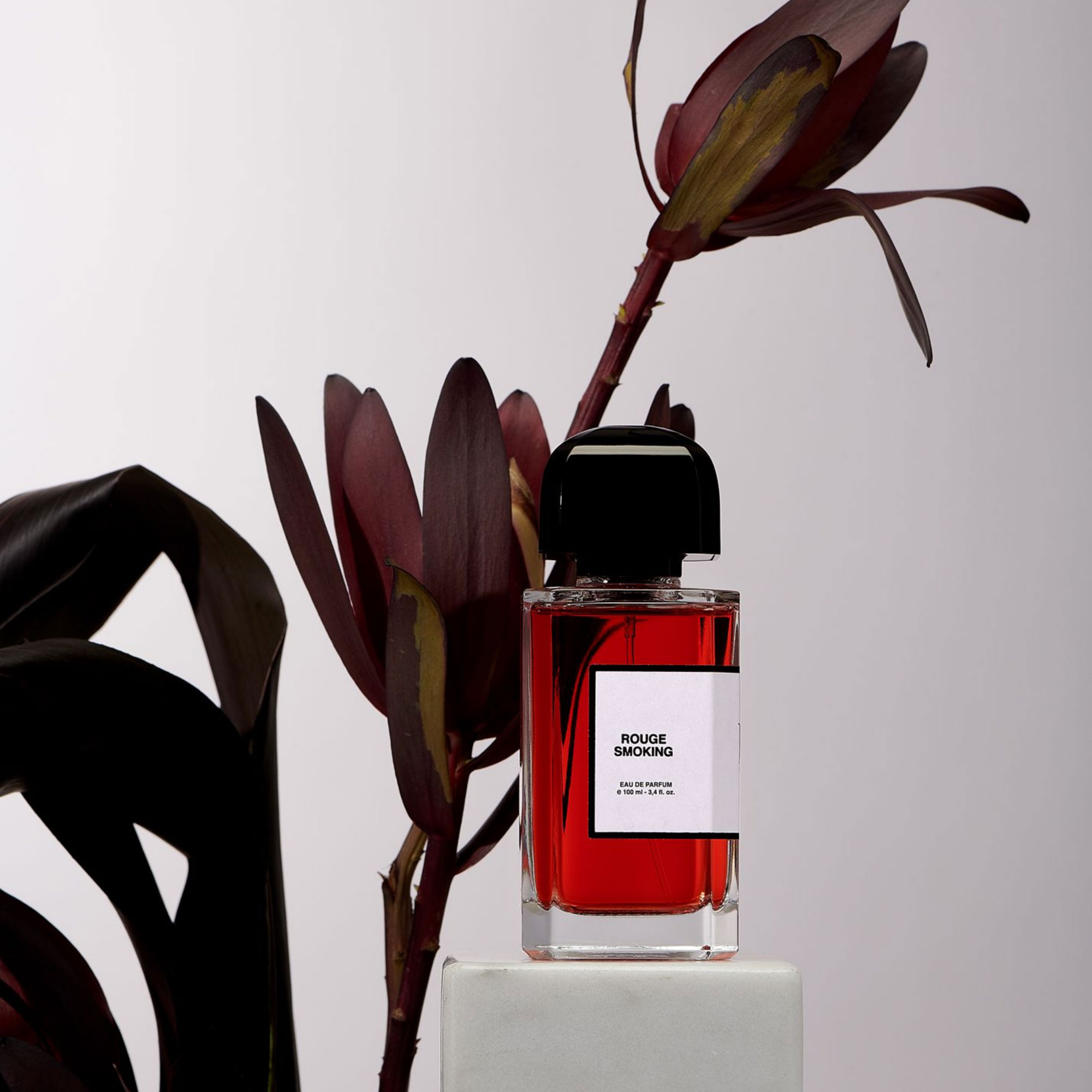 rouge smoking fragrance by bdk parfums with flowers