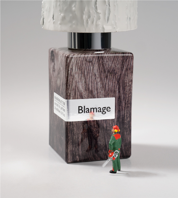 bottle of blamage by nasomatto with a small figurine