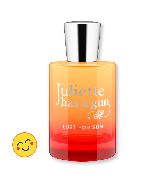 a bottle of lust for sun by juliette has a gun with a smiley face