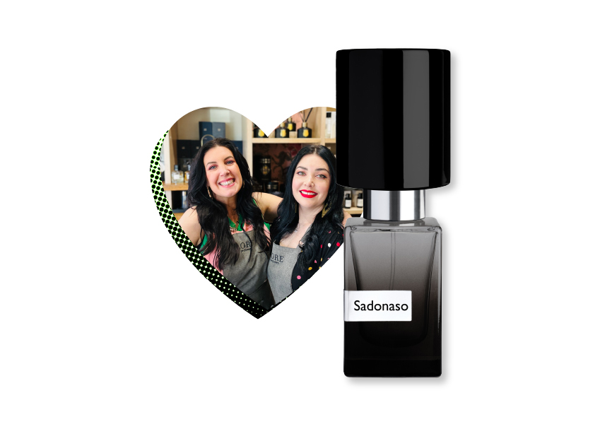 a bottle of sadonaso by nasomatto with a photo of jess and jade from lore in a heart